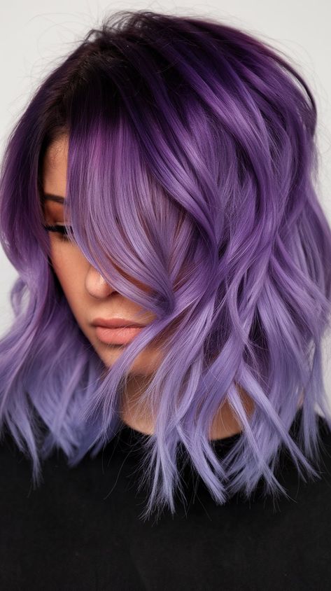 Discover the enchanting world of pastel hair with this stunning lavender and purple balayage! The soft waves and rich color blend create a playful yet sophisticated look. Perfect for those looking to add a touch of whimsy to their style while maintaining an air of elegance. Balayage Purple Hair Blonde, Peakaboo Underlights Lavender, Ash Blonde And Purple Hair, Blonde And Violet Hair, Lavender Hair Balayage, Purple Peek A Boo Hair, Purple Hair Ideas For Brunettes, Purple Hair With Money Piece, Light Purple Balayage