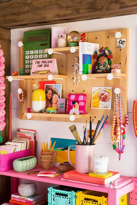 Bubblegum Pink Paint Turned This Backyard Studio Into a Crafting Wonderland | domino Photo Booth Picture Frames, Striped Accent Wall, Backyard Crafts, Desk Nook, Pegboard Display, Home Office Inspo, Modern Wrapping Paper, Craft Room Inspiration, Backyard Studio