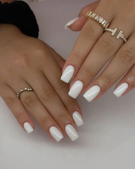 Are you in search of some attractive white nail designs to experiment with during this season? If yes, then you have landed on the right article! As summer is approaching, I have curated a list of my preferred styles to offer you some ideas. I have included various designs ranging from abstract to indie to cater to different preferences.Many of these styles can be easily replicated in the comfort of your own home! If you’re interested in trying a matte style, Classy White Nails Short, Short White Classy Nails, White Nail Manicure, White Square Nails Acrylics, Little Nails Ideas, White Design Gel Nails, Winter White Nails Short, Elegant White Nails Classy, White Acrylic With Design