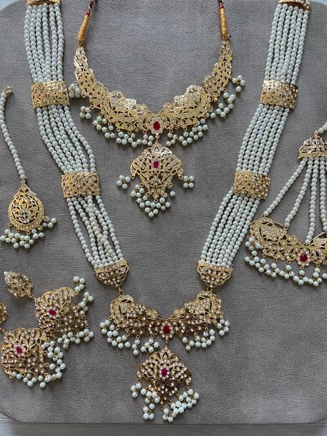 Pakistani / Indian / south Asian wedding jewellary set , perfect for a bride to be or to wear for a wedding event. Includes : Earrings Tikka Jhumar Choker Raani haar Comes with a jewellary box No refund or exchange due to hygiene reasons Pakistani Wedding Jewelry Sets, Pakistani Bridal Jewelry Sets Brides, Pakistani Wedding Jewelry Sets Gold, Luxury Traditional Bridal Necklace For Eid, Heavy Jewelry Sets For Wedding Eid, Indian Bridal Jewellery Set, Asian Bridal Jewellery, Bridal Jewellery Set, Pakistani Bridal Jewelry