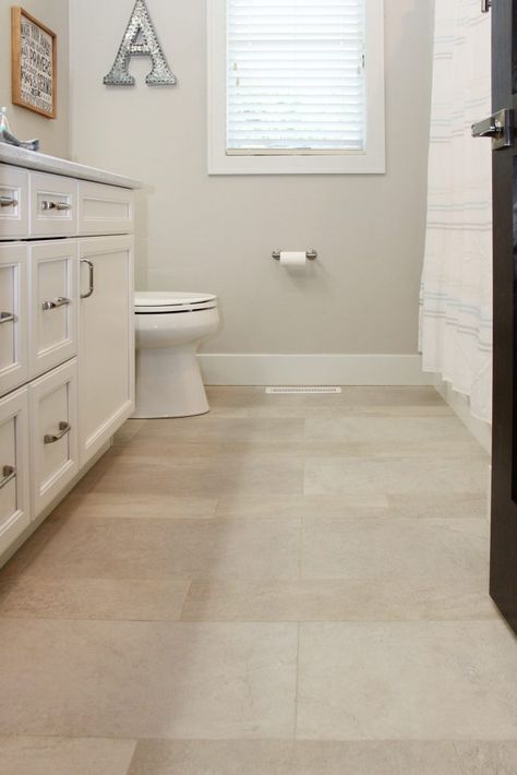 Cream Luxury Vinyl Tile Bathroom Flooring Ideas Beige, Vinyl Tile Flooring Living Room, Neutral Floor Tile Bathroom, Cream Tile Floor Bathroom, Bathroom Remodel Tan Tile, Luxury Vinyl Bathroom Floor, Beige Bathroom Floor Tile, Cream Bathroom Tile, Cream Tiles Bathroom