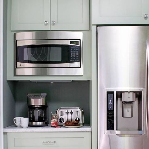 Breakfast Station        Efficiency is a must when cooking for a full house, and a compact breakfast bar, equipped with all the essentials, eases the morning routine. The built-in microwave saves counter space and anchors the breakfast station. The area also offers a coffeemaker and a toaster, and is also conveniently located next to the refrigerator. Built In Microwave Cabinet, Microwave Cabinet, Roller Door, Coffee Station Kitchen, Cabinet Inspiration, Kitchen Ikea, Outdoor Kitchen Appliances, Home Coffee Stations, Breakfast Bar Kitchen