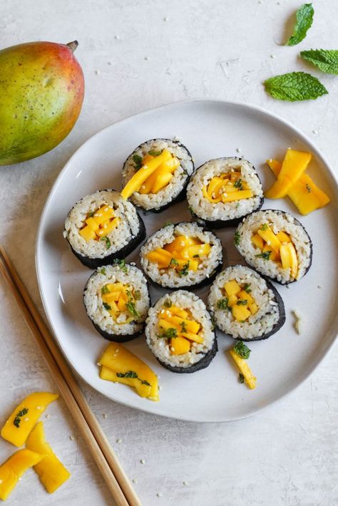 Dessert sushi twist on mango sticky rice! Nori sushi wraps stuffed with sweet coconut rice and fresh sliced mango. Serve with optional date syrup! Sushi Wraps, Sticky Rice Dessert, Mango Sushi, Tahini Date, Nori Sushi, Nori Wrap, Sushi Recipes Homemade, Dessert Sushi, Sushi Cake