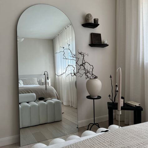 Product Description The Edge Arched Mirror, measuring 180cm x 80cm, features a sleek frameless design that adds modern elegance to any space. Its arched top and expansive reflective surface brighten rooms by beautifully amplifying natural light, making your space feel more open and inviting. Versatile and stylish, the Edge fits seamlessly in hallways, bedrooms, or living areas, complementing both contemporary and traditional interiors. Easy to install with secure fittings, this mirror offers sta Lean To Mirror Bedrooms, Mirror Opposite Bed, Arched Mirror Bedroom, Arch Mirror Bedroom, Minimalistic Modern Bedroom, Frameless Arch Mirror, Mirrors In Bedroom, Long Mirror In Bedroom, Black Arched Mirror