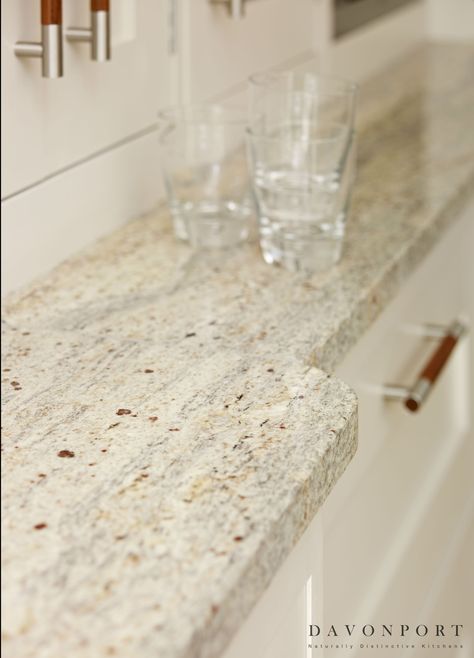 The Kashmir White granite worktops are perfectly in keeping with the light, contemporary theme of the design. The brown flecks give a gently nod to the walnut accents in the room such as the handles and curved breakfast bar. Breakfast Bar Worktop, Kashmir White Granite, Granite Worktops, White Countertop, White Granite, Granite Kitchen, Kitchen Worktop, Kitchen Remodeling Projects, Kitchen Diner