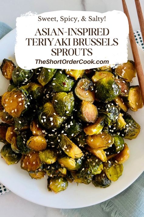 Plate of roasted Brussels sprouts with teriyaki sauce and sesame seeds. Asian Inspired Vegetables, Asian Inspired Vegetable Sides, Brussel Sprout Recipes Asian, Asian Inspired Brussel Sprouts, Asian Roasted Brussel Sprouts, Japanese Brussel Sprouts, Korean Brussel Sprouts, Asian Brussel Sprout Recipes, Teriyaki Brussel Sprouts