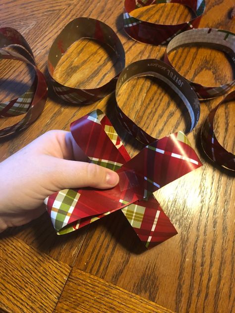 Making Bows Out Of Wrapping Paper, Making A Bow Out Of Wrapping Paper, Bows For Presents How To Make, Wrapping Paper Bow Easy, How To Make A Bow From Wrapping Paper, Bows From Wrapping Paper, Diy Paper Bows For Presents, Diy Bow From Wrapping Paper, How To Make Paper Bows