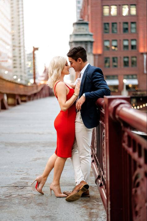 Couple Photoshoot City Picture Ideas, Downtown Chicago Photoshoot, Romantic City Engagement Photos, Chicago Couples Photoshoot, Chicago Riverwalk Engagement Photos, Downtown Chicago Engagement Photos, Chicago Couple Pictures, Red Dress Engagement Pictures, Engage Photos