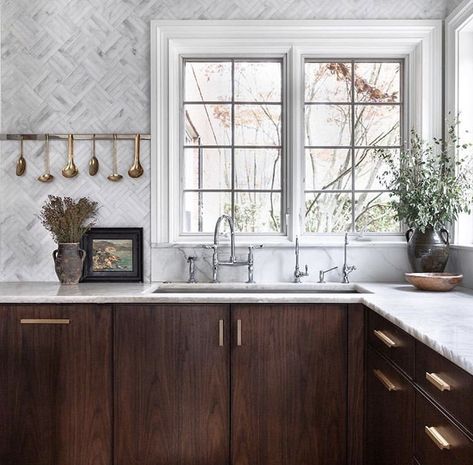 Minimal and beautiful. Flat panel, overlay cabinet doors in a deep warm wood tone contrasted with cool marble backsplash. . #beinspired --> @hauslove @foxandthehome   #kitchendesign #kitchens #woodkitchen #modernkitchens #backsplashdesign #interiordesign #design #interiors #cabinetry #backsplashdesign Walnut Kitchen Cabinets, No Upper Cabinets, Dark Wood Kitchen Cabinets, Bridge Faucet, Dark Wood Kitchens, Utensil Rack, Walnut Kitchen, Dark Wood Cabinets, Wood Kitchen Cabinets