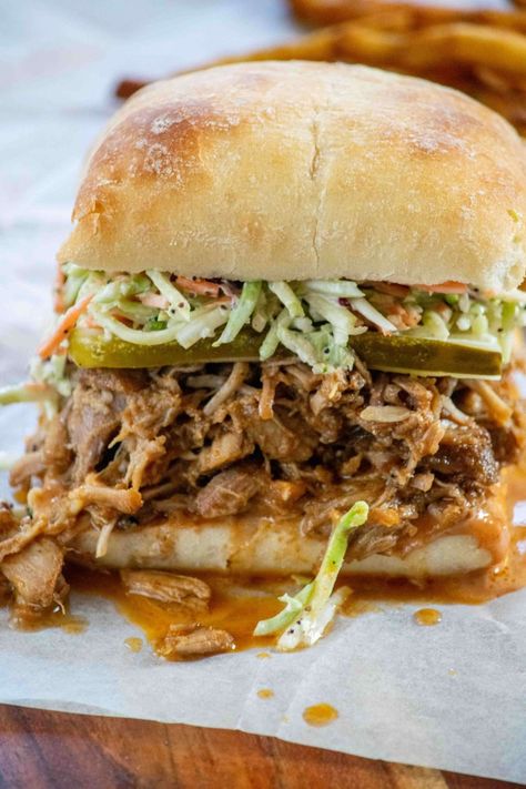 This Easy BBQ Pulled Pork Crock Pot Recipe makes the juiciest, flavor-packed BBQ pulled pork, with just a simple spice rub and some slow cooked pork! Makes a great set and forget party food or meal prep for the week! Bbq Pulled Pork Crock Pot, Pulled Pork Crock Pot Recipes Bbq, Pulled Pork Crock Pot Recipes, Pulled Pork Crock Pot, Pork Crock Pot, Pulled Pork Crock, Crockpot Pulled Pork Bbq, Pork Crock, Crock Pot Pulled Pork Recipe