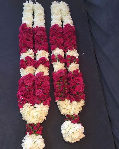 This garland is made from fresh fresh flowers by Sai Garlands. We specialise in making fresh flower garlands for Indian or hindu weddings! This pair of garlands is made from white carnations and magenta baby roses. The colours and style can be customised for your liking! Red Rose Varmala Indian Weddings, Jay Mala For Wedding, Varmala Indian Weddings Rose, Rose Garland Wedding Indian, Rose Garlands Wedding Indian Flower, Red Rose Varmala, Unique Indian Wedding Garland, Wedding Garlands Indian, Rose Varmala