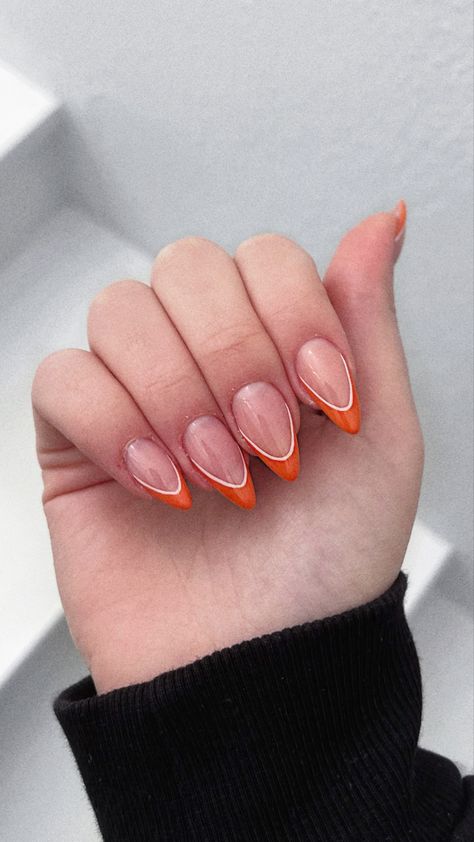 Trending Orange Nails, White And Orange French Nails, Orange And White Almond Nails, White French Tip With Orange Line, Orange Wedding Nails For Bride, Orange And White Halloween Nails, Autumn Minimalist Nails, Pumpkin Tip Nails, Burnt Orange And White Nails