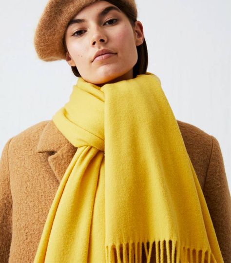 How to Wear a Scarf in 2019 | Who What Wear UK Wear A Scarf, Winter Scarves, Yellow Scarf, How To Wear A Scarf, Oversized Scarf, How To Wear Scarves, Pale Yellow, Wool Scarf, Knit Scarf