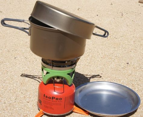 Drinking Salt Water Method 1: Boil – Evaporate – Collect: Place the lid on the pot so that it is slightly tilted to one side and hanging off the edge of the pot. The condensed water will travel down to the lowest point. Place a receptacle right under the lowest point of the lid Best Camping Stove, Camping Pot, Backpacking Stove, Camp Food, Cooking Kit, Alcohol Stove, Portable Stove, Camping Set, Camping Cookware