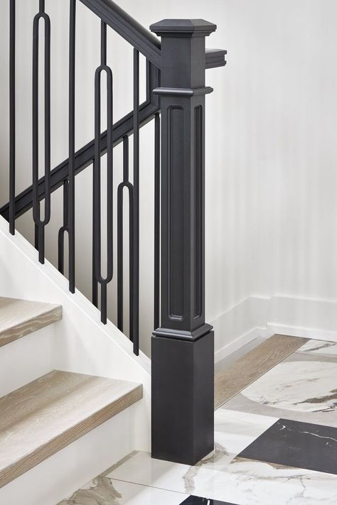 This staircase imbues a modern style with TimeLine® geometric metal balusters paired with the elegant details in the wood newel posts, painted black for a dramatic backdrop in this Minto Dream Home. Metal Newel Post, Black Newel Post Stairways, Modern Metal Stair Railing, Stairway Spindles, Metal Spindles Staircase, Newel Posts For Stairs, Kichen Remodel, Metal Stair Spindles, Staircase Metal