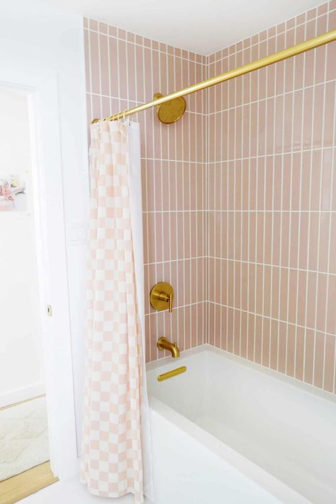 Laura's Pink Tile Bathroom Makeover (Before + After) - A Beautiful Mess Girls Bathroom Tile, Pink Tile Bathroom Makeover, Tile Bathroom Makeover, Kid Bathroom Ideas, Girl Bathroom Ideas, Pink Tile Bathroom Ideas, Pink Tile Bathroom, Pink Bathroom Tiles, Pink Tub