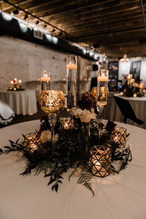 Gold Leaf and Chimney Stem Candles | Centerpieces Black Candle Centerpieces Round Table, Mens 70th Birthday Centerpieces, Simple Gothic Wedding Centerpieces, No Candle Centerpieces Wedding, Black White Gold Gala Decor, Table Sponsor Centerpieces, Gold And Black Table Decorations, Black White And Gold Wedding Table Decor, Black White And Gold Wedding Theme