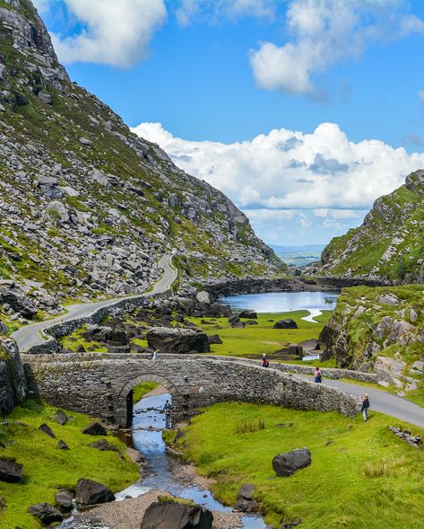 County Kerry, Ireland  Forged by ancient glacial waters, the Gap of Dunloe offers awe-inspiring views in our #SightSeeingSunday image of the week. Located in County Kerry, Ireland, the Gap of Dunloe was formed between the MacGillycuddy Reeks and Purple Mountain. Visitors to the scenic Gap can hire a horse-drawn wagon to take in the sights.  Have a restful Sunday!  #travelphotography #beautifuldestinations #sightseeing #sightseeings #travel #sundayvibes #sightseeingsunday #sundayvibes Ireland Cork, Gap Of Dunloe, Famous Lighthouses, Moving To Ireland, Ireland Road Trip, Gorgeous Places, Kerry Ireland, Irish Countryside, Canadian Military