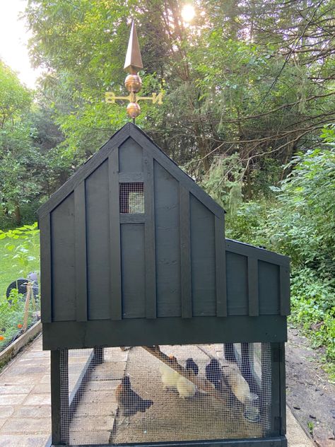 Copper finial, chicken coop, scandinavian black Chicken Coop Ideas Black, Minimalist Chicken Coop, Scandinavian Chicken Coop, Dark Green Chicken Coop, Black Chicken Coop Ideas, Gothic Chicken Coop, Tall Chicken Coop, City Chicken Coop, Chicken Coop Landscaping