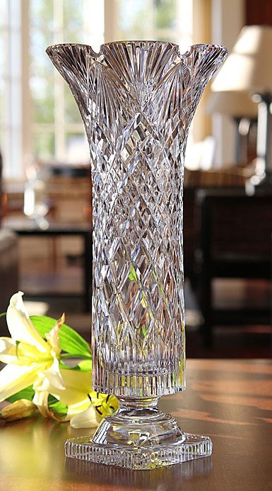 This beautiful trumpet shaped Crystal Vase takes its name from the Gaelic word for flower or blossom which is Blath. The name Blanaid expresses the graceful delicacy of a woman often associated with the beauty of flowers. This tall elegant Crystal Vase with its narrow waist and flared top is perfectly formed to hold and display even the most delicate bouquet. Crystal Vases, Word F, Bohemia Crystal, Concrete Vases, Wooden Vase, Vase Shapes, Crystal Glassware, Antique Vase, Crystal Vase