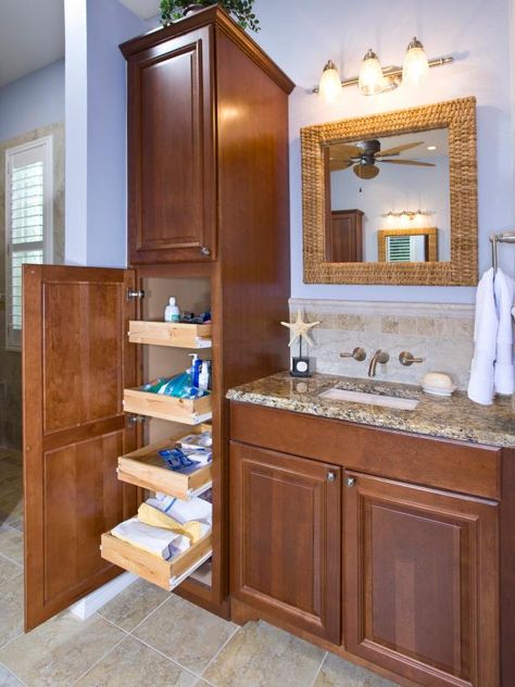 18 Savvy Bathroom Vanity Storage Ideas | HGTV Bathroom Vanity Storage Ideas, Vanity Storage Ideas, Modern Apartment Bathroom, Apartment Bathroom Decor, Bathroom Vanity Organization, Diy Trinkets, Tall Bathroom Storage Cabinet, Tall Bathroom Storage, Shelves Over Toilet