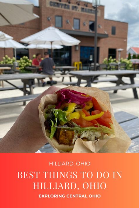 Discover the charm of Hilliard, Ohio with this list of must-do activities! From exploring the trails of Homestead Metro Park to enjoying in local flavors at the Center Street Market, there's something for everyone! Bocce Court, Ohio Travel, Park Playground, Splash Pad, Fish Ponds, Street Market, Nature Center, Summer Concert, Covered Bridges