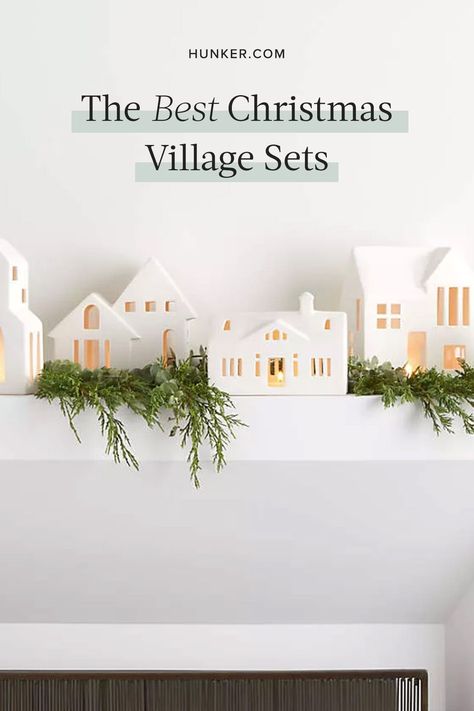 Whether you're looking for village pieces or unique additions to your current collection, here's a list of some of our favorite Christmas village sets. #hunkerhome #christmasvillage #christmasdecor #christmasdecorideas #holidaydecor Christmas Houses Village Display White, Diy White Houses Christmas, Christmas White Village Display, Christmas Village Console Table, White House Christmas Village, White House Village Christmas, Christmas Village Garland, All White Christmas Village, All White Christmas Village Display