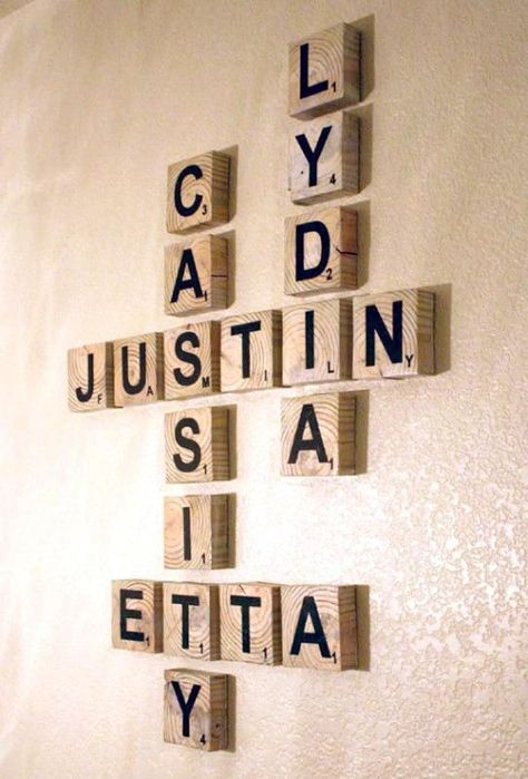 One of our great featured DIY wall art tutorials, family name scrabble tiles. Find more DIY wall art ideas at remodelaholic.com 4x4 Wood Crafts, Name Art Projects, Family Name Art, Media Room Decor, Family Art Projects, Scrap Wood Crafts, Scrabble Art, Wood Scraps, Scrap Wood Projects