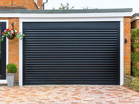 Automatic Roller Garage Doors | Everest Black Garage Door, Black Garage Doors, Carriage Garage Doors, Automatic Garage Door, Black Garage, Cottage Front Doors, Wooden Garage Doors, Sectional Garage Doors, Garage Door Types