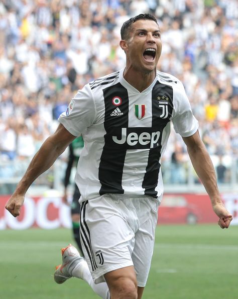 TURIN, ITALY - SEPTEMBER 16:  Cristiano Ronaldo of Juventus FC celebrates after scoring the opening goal during the serie A match between Juventus and US Sassuolo at Allianz Stadium on September 16, 2018 in Turin, Italy.  (Photo by Emilio Andreoli/Getty Images) Cristiano Ronaldo Team, Juventus Ronaldo, Cristiano Ronaldo Manchester United, Portugal National Football Team, Cr7 Juventus, Ronaldo Photos, Cristiano Ronaldo Real Madrid, Cristiano Ronaldo Juventus, Cristino Ronaldo