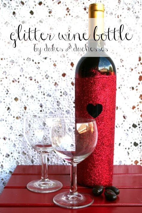 A DIY glitter wine bottle. I don't drink alcohol but this is cute for those who enjoy wine. Glitter Wine Bottles, Fancy Ribbon, Diy Valentine's Day Decorations, Glitter Bottle, Diy Glitter, Glitter Wine, Glitter Diy, Wine Bottle Crafts, Simple Valentine