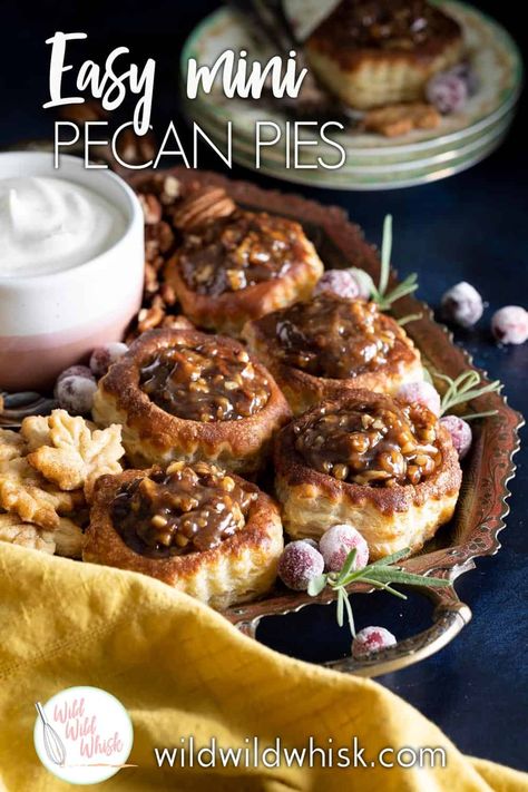 These Mini Pecan Pies are made with premade puff pastry shells and a maple pecan pie filling cooked on the stove top. It is super easy to throw together at the last minute when you need a Thanksgiving dessert quick! #wildwildwhisk Pecan Pie Puff Pastry Bites, Puff Pastry Shell Recipes, Puff Pastry Shells Recipes Desserts, Mini Pecan Pies No Corn Syrup, Puff Pastry Shells Recipes, Mini Pecan Pies Without Corn Syrup, Easy Mini Pecan Pie Tarts, Pecan Pie Tarts Mini Phyllo, Tiny Desserts