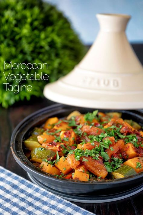 Moroccan influenced vegetable tagine, a dish that gets a hint of spice from harissa paste, a fab dish to use up leftover veg in the pantry. This easy tagine is both vegan and vegetarian, and whilst it takes around 50 minutes to make, only 10 minutes of that time is spent in the kitchen! Vegan Tagine, Vegetarian Tagine, Moroccan Tagine Recipes, Vegetable Tagine, Tajin Recipes, Tagine Cooking, Moroccan Vegetables, Persian Recipes, Tagine Recipes