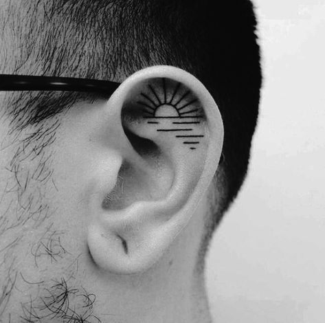 A beautiful, and minimalist, sunset: | 19 Beautiful Tattoos That Will Look Perfect On Your Ears Runes Tattoo, Inner Ear Tattoo, Minimalist Tattoo Meaning, Tatuagem Masculina Pequena, Sunset Tattoos, Ear Tattoos, Semicolon Tattoo, Theme Tattoo, Geniale Tattoos