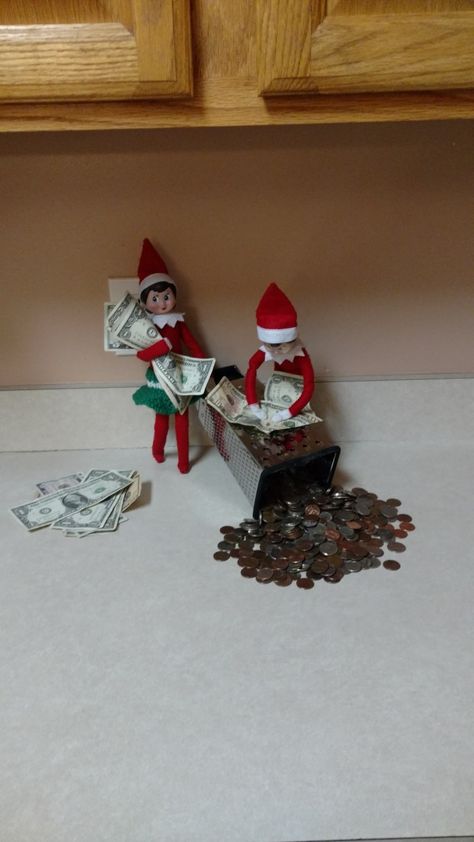 Elf on the shelf idea. Turning paper money into coins Elf On The Shelf With Money Ideas, Elf On The Shelf Money Ideas, Elf On The Shelves, Elf Printables, Tree Props, Elf On The Shelf Idea, Awesome Elf On The Shelf Ideas, Dog Waste Bag Holder, Elf Activities