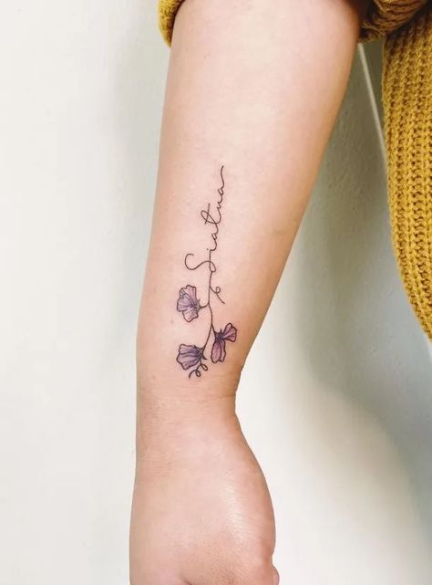 20 Charming Sweet Pea Flower Tattoo For Girls in 2022 16 Sweet Pea Name Tattoo, Sweet Pea Wrap Around Tattoo, Sweetpea Tattoos, Daisy And Sweetpea Tattoo, Small Sweet Pea Tattoo, Daisy And Sweet Pea Tattoo Birth Flower, Sweet Pea Tattoo Design, Daisy And Sweet Pea Tattoo, Sweetpea Tattoo