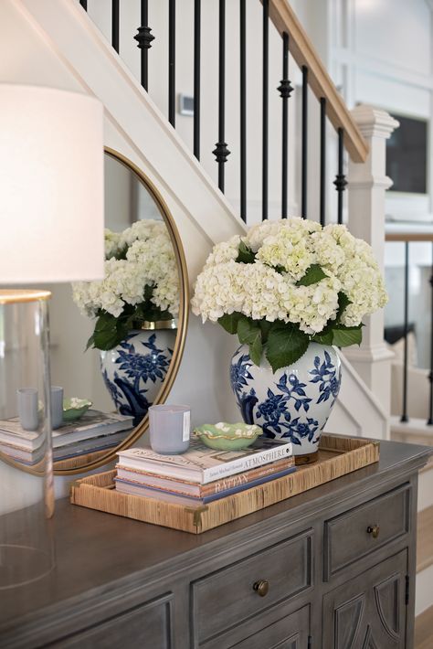 Console Table Next To Stairs, Chinoiserie Farmhouse Decor, Hydrangea Living Room, Foyer Table Decor Entryway Traditional, Chinoiserie Entry Table, Console Tray Decor, Table In Foyer, Counsel Table Decor, Living Room Off Entryway