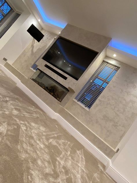 Venetian Plaster Living Room, Plaster Tv Wall, Venetian Plastering, Venetian Plaster Media Wall, Venician Plaster Walls, Venetian Plaster Fireplace, Luxury Tv Wall, Log Burner Living Room, Venetian Plaster Walls