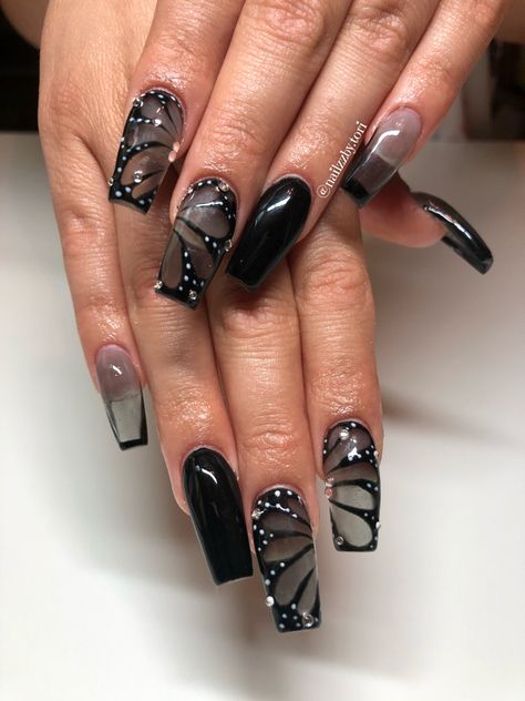 Black butterfly acrylic nails medium length Medium Length Black Acrylic Nails, Acrylic Nail Medium Length, Gothic Butterfly Nails, Medium Black Nail Designs, Black Acrylic Nails Medium Length, Black Butterfly Nail Designs, Black Medium Length Nails, Medium Length Nails Black, Black Nails Medium Length