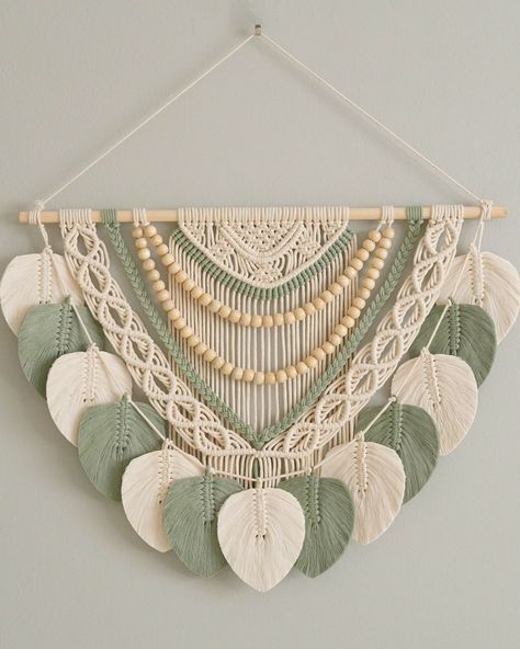 🌳 Embrace a green lifestyle and an eco-friendly environment with our Macrame Wall Art With Leaf Tassel! This stunning Macrame Wall Hanging brings a touch of boho elegance to any space, making it an ideal addition to your Green Home Decor. 🌿 ✨ Discover the magic at https://beandaikon.etsy.com/listing/1580554592 or connect with us directly 🌈 #bohodecoration #handmadeitems #macramewallart #homedecorinspiration #macrametasselgarland #bohovibes #homedecoratingideas #handmadegiftideas #bohemianv... Art With Leaf, Leaf Macrame Wall Hanging, Macrame Charm, Jungle Animal Nursery, Leaf Macrame, Tassel Wall Hang, Eclectic Wall Decor, Macrame Leaf, Boho Kitchen Decor