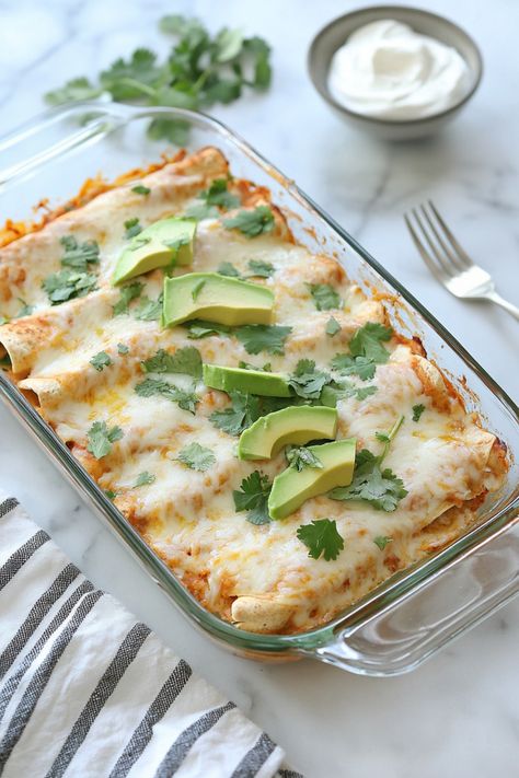 Indulge in a comforting and hearty meal with these easy-to-make chicken enchiladas using cream of chicken soup. The creamy sauce adds a rich flavor to the tender shredded chicken wrapped in warm corn tortillas. This recipe is perfect for busy weeknights or when you're craving some delicious Mexican-inspired flavors. Serve these cheesy enchiladas with your favorite sides for a satisfying dinner that the whole family will enjoy. Creamy Chicken Enchiladas Cream Of Chicken Soup, Cream Of Chicken Soup Enchiladas, Creamy Chicken Enchilada Soup, Homemade White Sauce, Creamy Pasta Bake, Cheesy Enchiladas, Creamy Chicken Enchiladas, Sour Cream Chicken, Creamy Chicken Soup