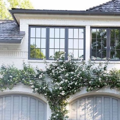 Trellis Front Of House, Vine On House, Climbing Jasmine Trellis, Climbing Roses On House, Garage Door Trellis, Vertical Landscaping, Climbing Jasmine, Jasmine Vines, Garage Trellis