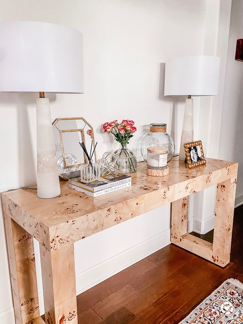 Entry way style with this burl wood console table. Still looking for the perfect mirror to hang above it but so obsessed with these lamps! . .  http://liketk.it/2UJYY #liketkit @liketoknow.it #StayHomeWithLTK #LTKhome #LTKstyletip @liketoknow.it.home  . . Entry way style - marble lamps - glass knot decor - coffee table books - burlwood console table Burled Wood Entry Way Table, Console Table Under Floating Shelves, Burlwood Entry Table, Desk As Entry Table, Burl Console Table, Burlwood Console Table, Glass Entry Table, Burled Wood Console Table, Burl Wood Console Table