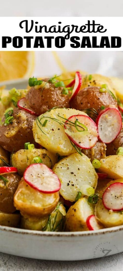 A tangy lemon, oil, and red wine vinegar dressing brings this Lemon Vinaigrette Potato Salad to life. Everyone will rave about this fresh and zesty potato salad. #ourzestylife #vinaigrettepotatosalad #lemonvinaigrettepotatosalad #sidedish #recipe #vinaigrette #lemon #dressing #warm #herb #cold #bbq #withlemondressing #vinaigrettedressing #easydressing Potato Salad Recipe With Vinegar, Vinegar Potato Salad, Red Skin Potato Salad, Herbed Potato Salad, Red Potato Salad Recipe, Potato Salad With Apples, Roasted Potato Salads, Potato Salad Dressing, Zesty Salad