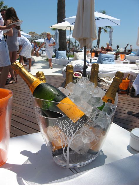 Champagne on ice. Marbella Beach Club, Marbella Beach, Ibiza Party, Poolside Glamour, Veuve Clicquot Champagne, Malaga Airport, South Beach Hotels, Nikki Beach, Puerto Banus