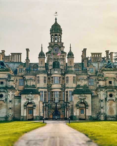 Harlaxton Manor is a Victorian country house in Harlaxton, Lincolnshire, England. It was built for Gregory Gregory, a local squire and businessman. Gregory employed two of the leading architects of Victorian England, Anthony Salvin and William Burn and consulted a third, Edward Blore, during its construction. It is now the British campus of the University of Evansville. @harlaxton_manor - #historicpreservation #georgianarchitecture #georgianhouse #harlaxtonmanor #statelyhome #classicalarchi... Harlaxton Manor, University Of Evansville, Victorian Country House, British Manor, Haunted Manor, Lincolnshire England, Victorian Manor, British House, Antique Architecture