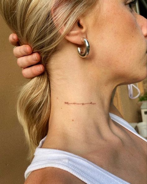 Tasteful Neck Tattoos, Simple Word Neck Tattoo, Script On Neck Tattoo, Discret Tattoos For Women, Small Script Neck Tattoo, Discrete Neck Tattoo, Muse Neck Tattoo, Minimal Neck Tattoos Women, One Word Cursive Tattoo