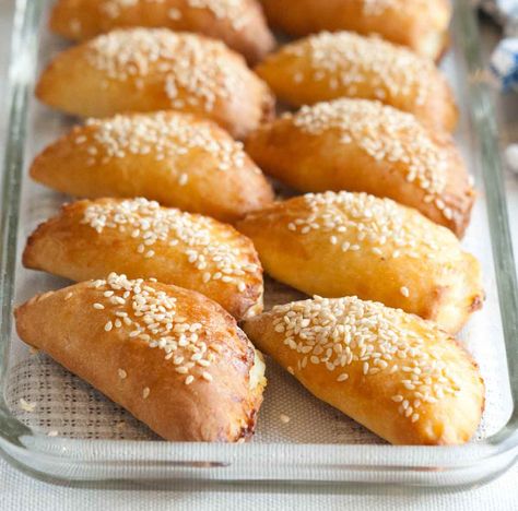 These borekitas are a traditional Sephardic recipe made with dough and plenty of cheese. A lovely appetizer or snack. Turkish Biscuit Recipes, Borekas Recipe, Burekas Recipe, Cheese Burek Recipe, Baking Dough Recipe, Piroshki Recipe, Burek Recipe, Balkan Recipes, Borek Recipe