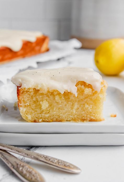 This Lemon Texas Sheet Cake tastes like the homemade version of the boxed cake, and it's incredible! Super moist with the perfect lemon-vanilla flavor, it's the perfect spring dessert! Doctored Lemon Box Cake, Strawberry Lemon Sheet Cake, Lemon Texas Sheet Cake, Lemon Sheet Cake With Glaze, 8 Inch Lemon Cake Recipe, Best Lemon Cake, Aunt Tc's Lemon-lime Soda Cake, Delicious Lemon Cake, Breakfast Cupcakes