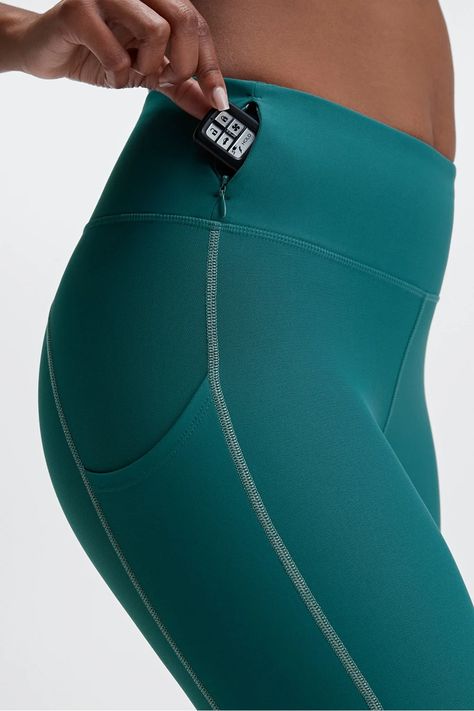 High-Waisted Cold Weather Reflective Pocket Legging - Fabletics Running At Night, Sportswear Details, Cold Weather Leggings, Running In Cold Weather, Buy Leggings, Sportswear Leggings, Bra Size Charts, Sportswear Fashion, Kate Hudson